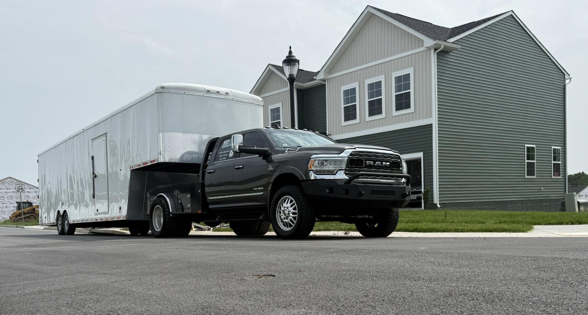 Long distance moving truck and trailer loaded for an interstate move from Dallas Fort Worth
