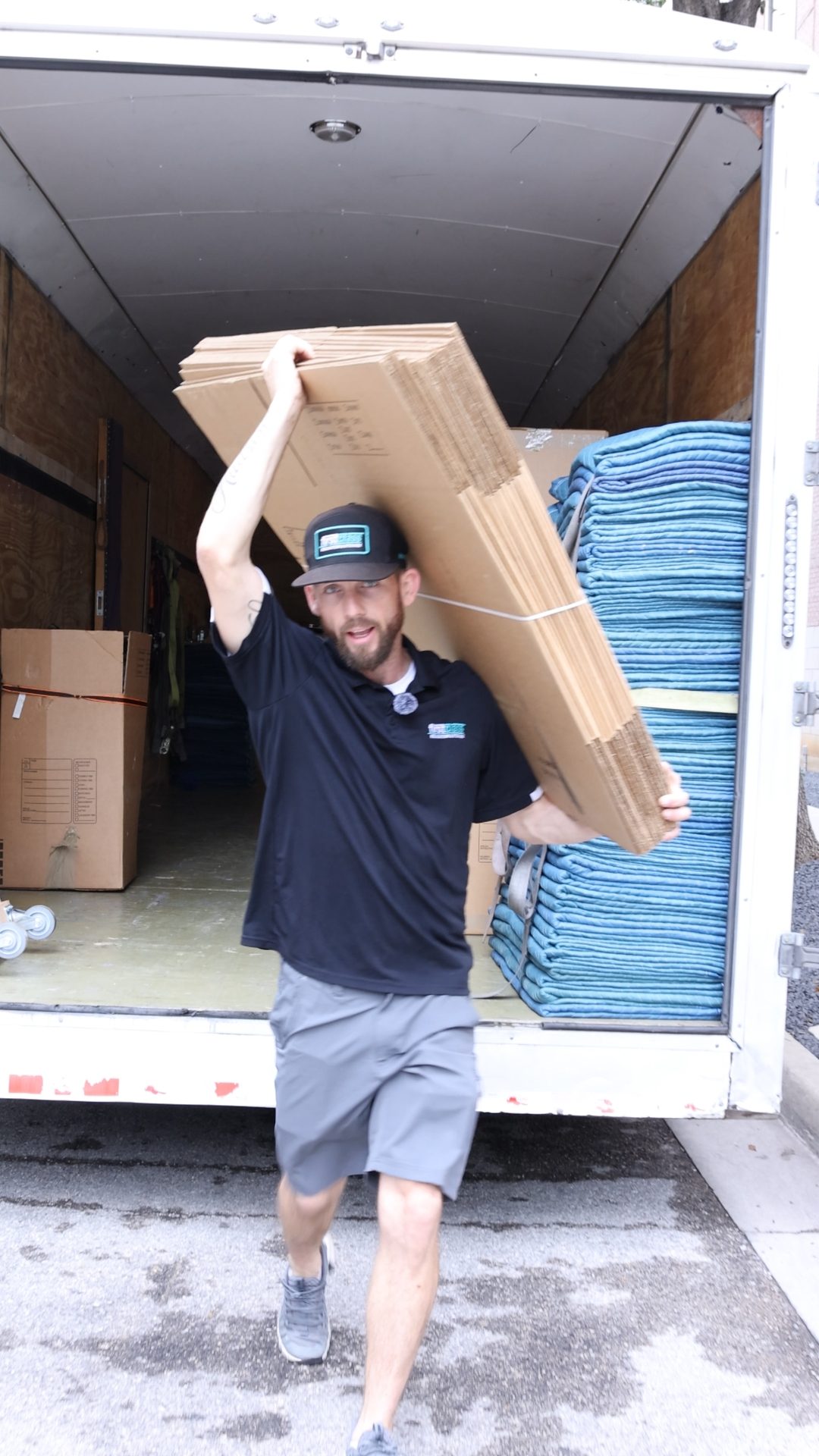 Mover unloading boxes at a home in the Dallas Fort Worth Metroplex